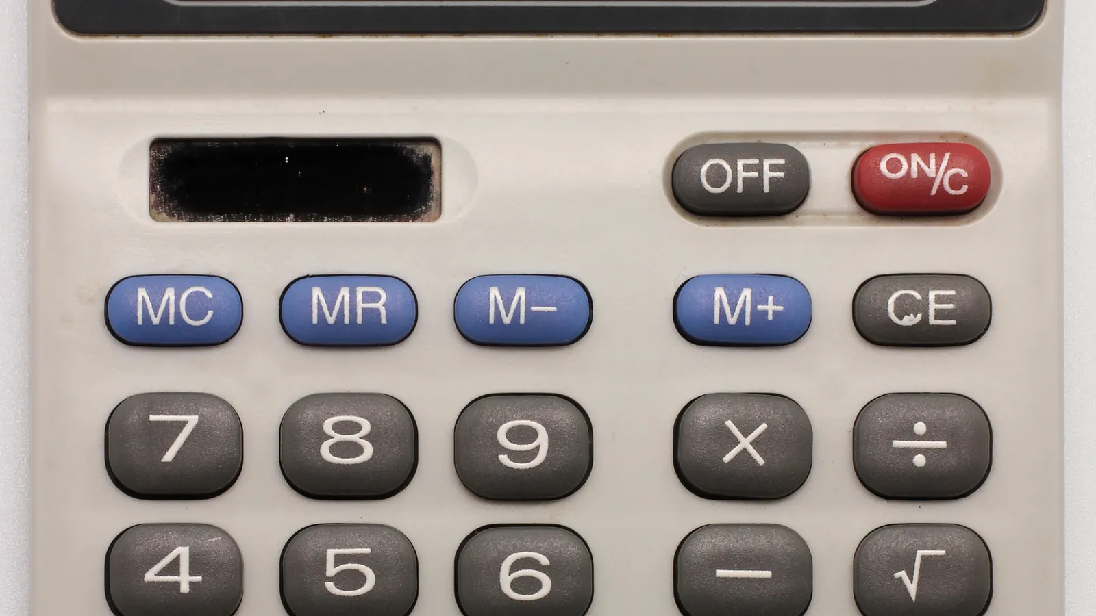 A desktop calculator with a large keypad and a digital display